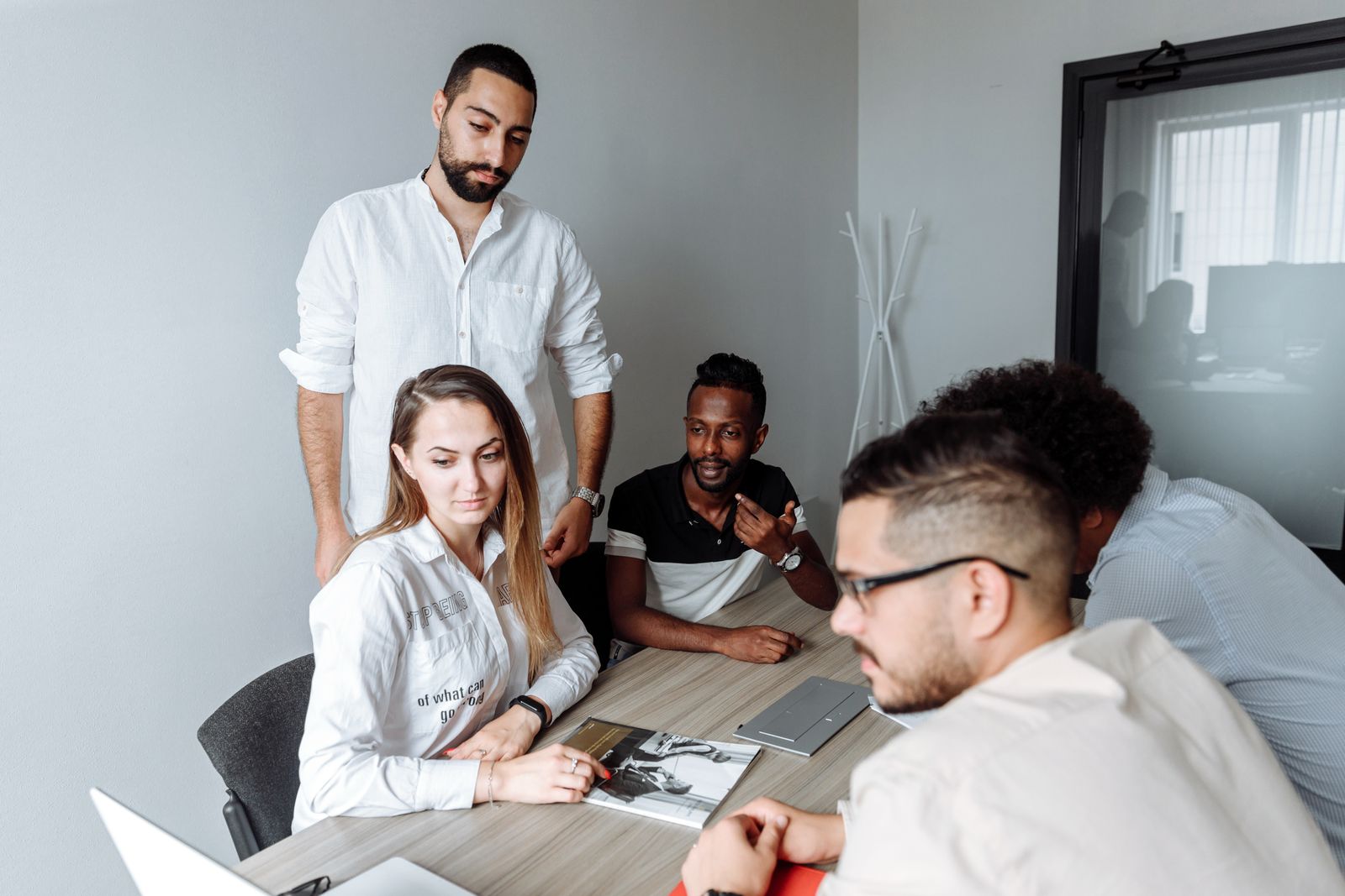 SEO team collaborating in a modern office