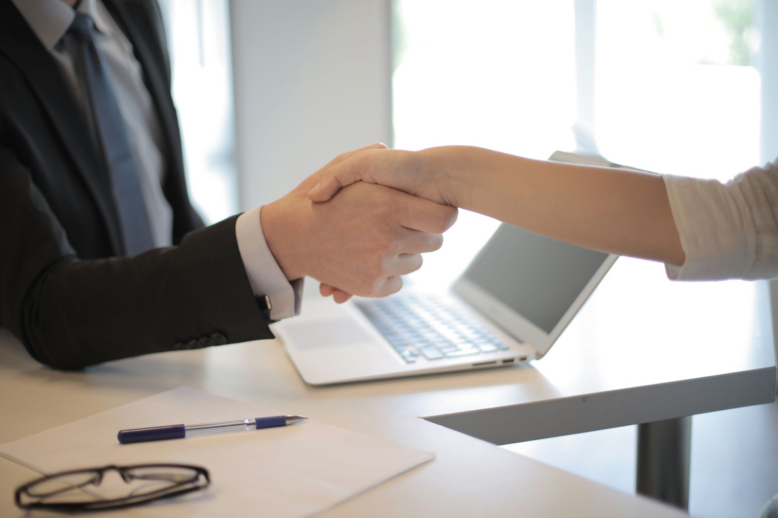 Business consultation over a laptop